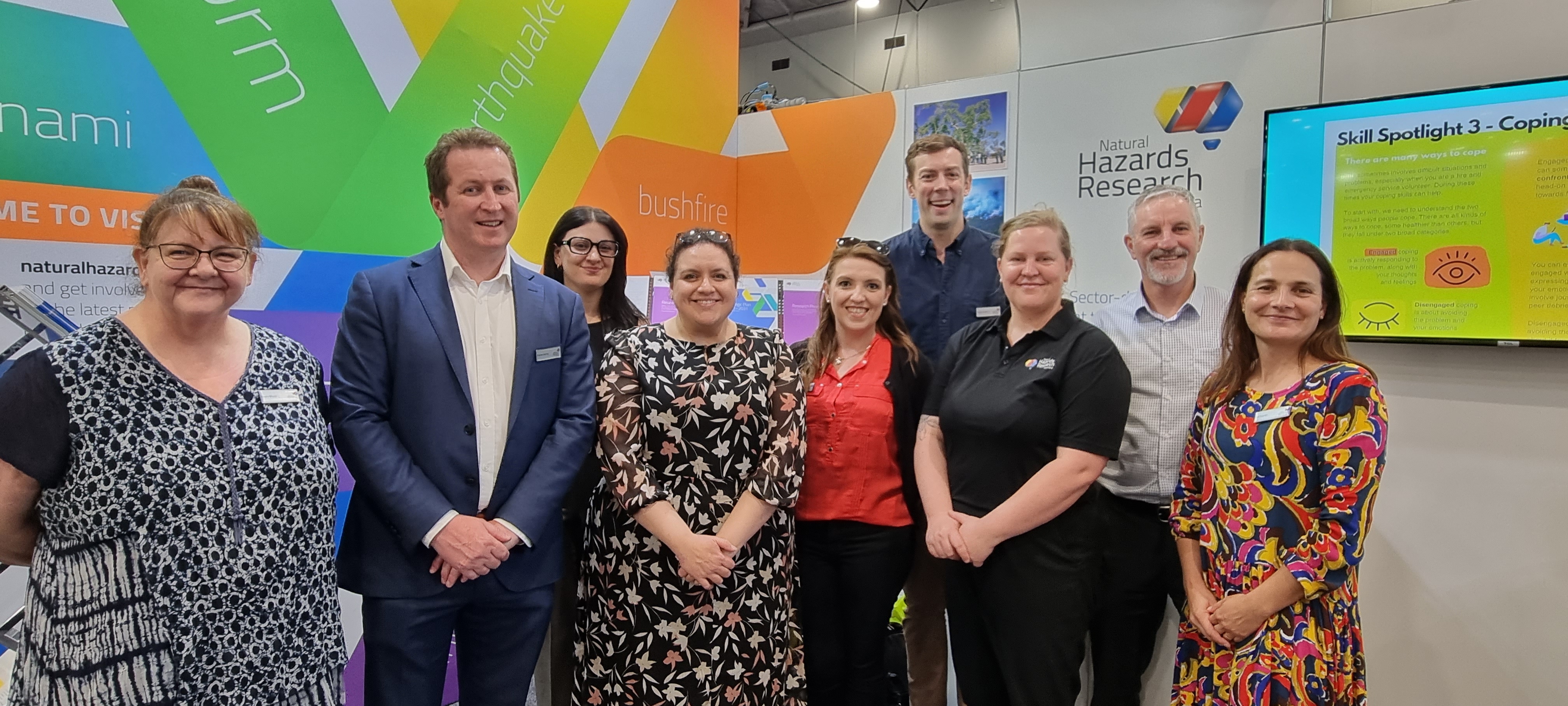 A photo of NHRA staff at their AFAC23 booth