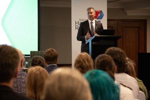 Paul Papalia presenting on stage